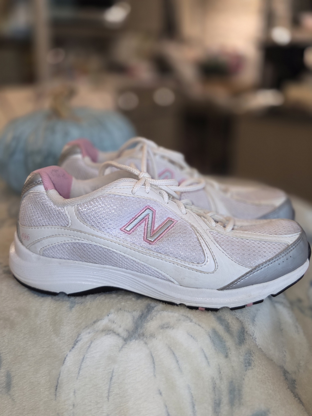 New Balance Womenβs White & Pink Athletic Sneakers